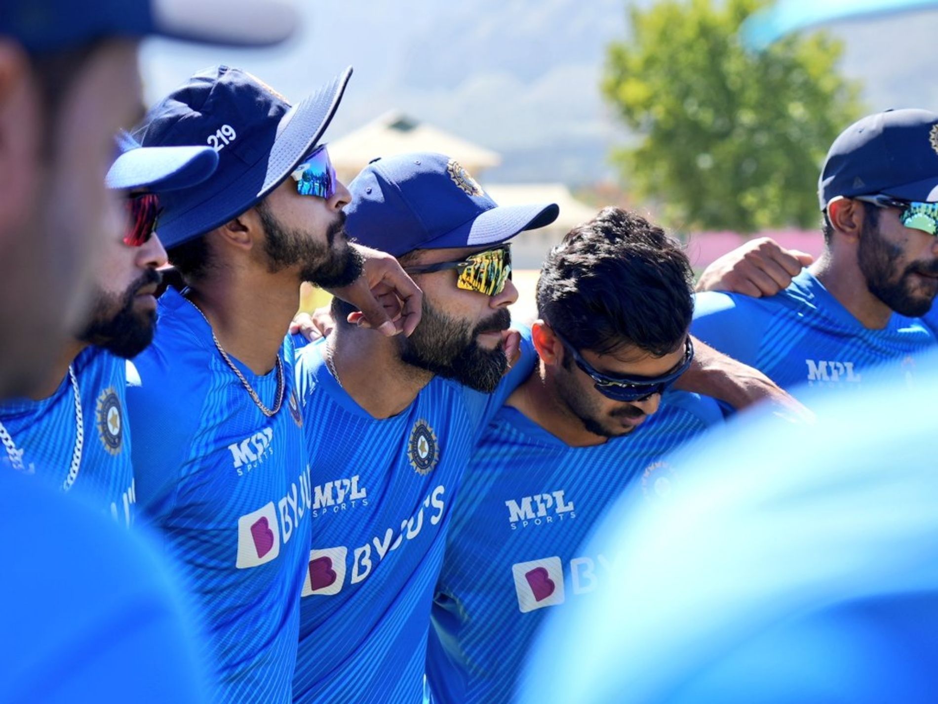 Former captain Virat Kohli joins the team huddle. Pic: BCCI