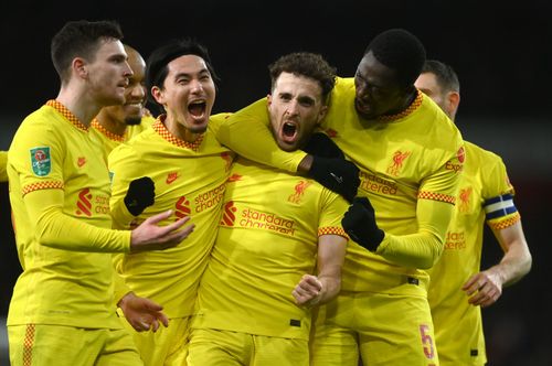 Diogo Jota celebrates his second goal of the night against Arsenal.