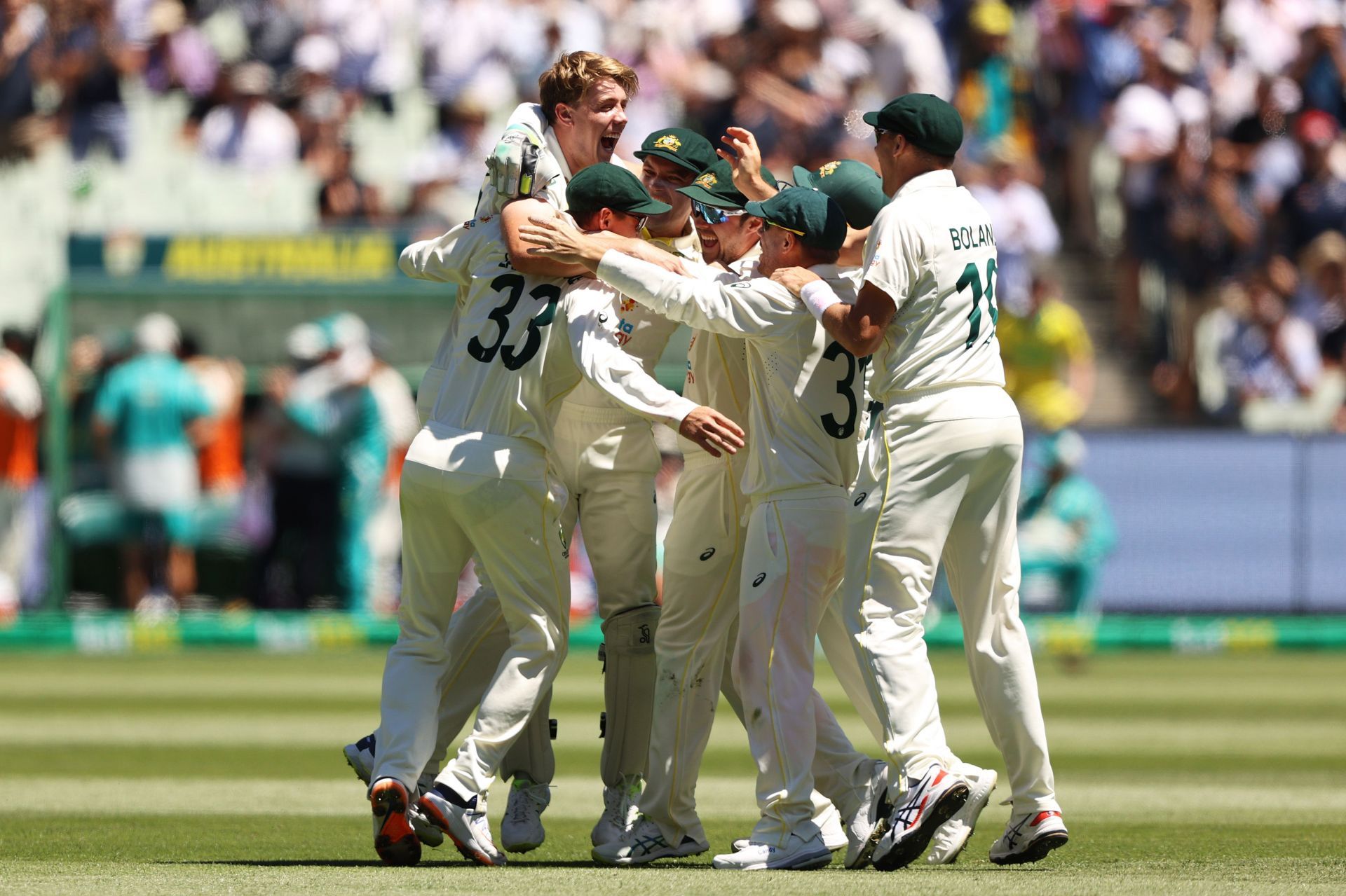 Australia celebrate after winning the Boxing Day Test at the MCG and thereby retaining the Ashes with an unassailable 3-0 lead.