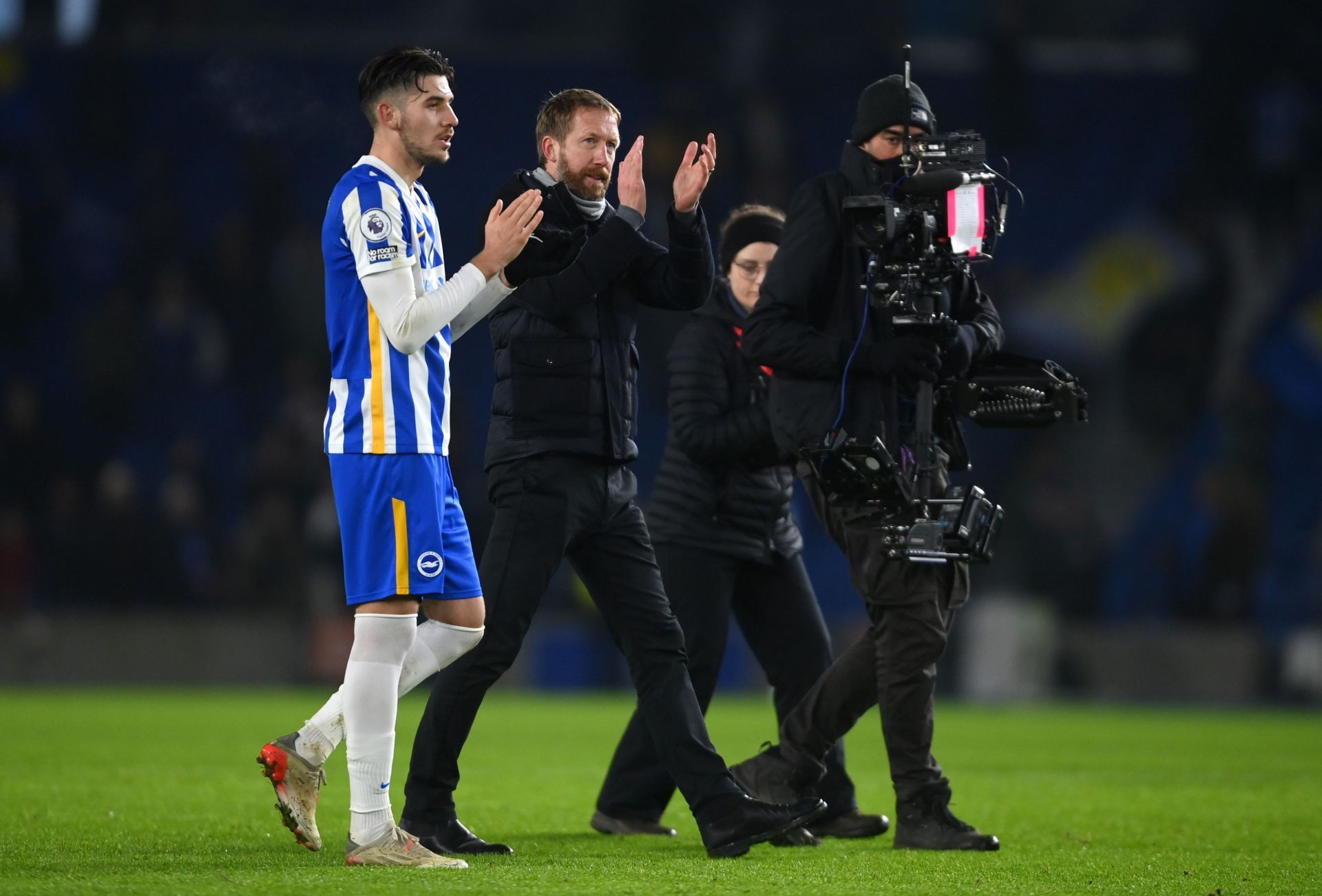 Graham Potter applauds the fans.