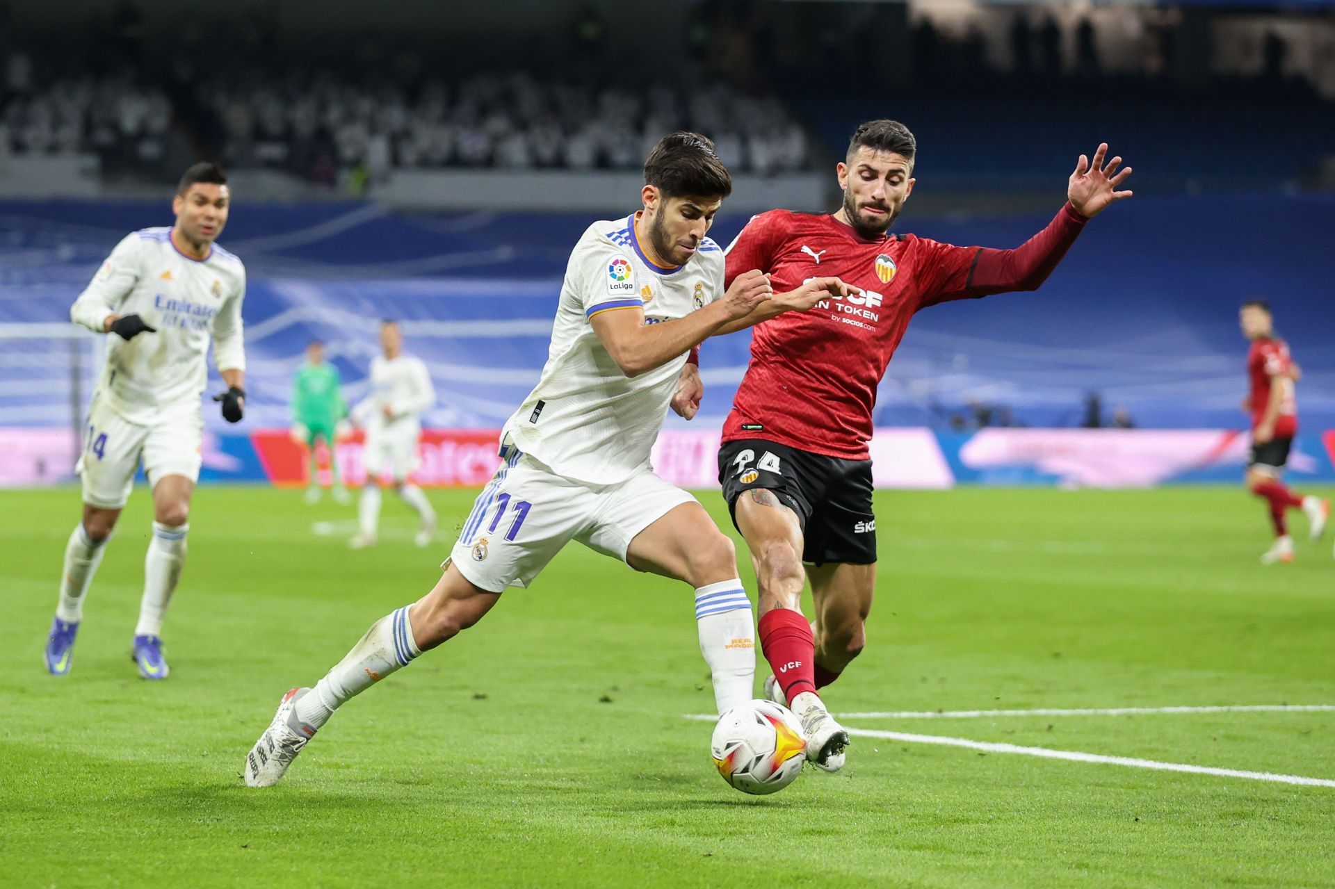 Marco Asensio in action against Valencia