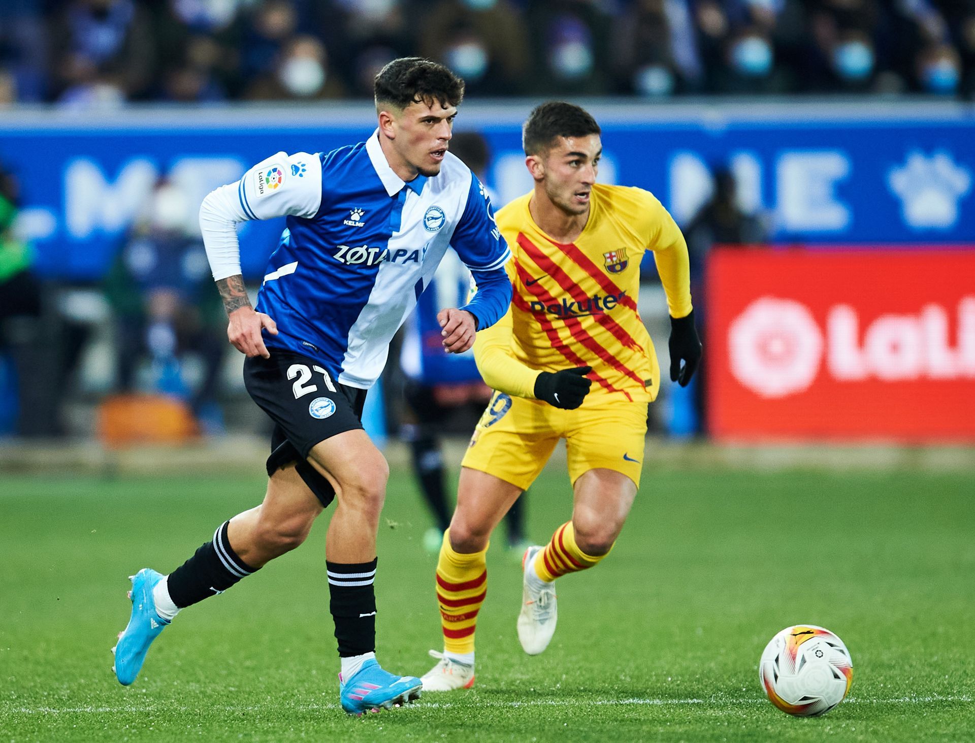 Ferran Torres tussles it out against Javi Lopez.