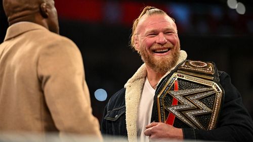 WWE Champion Brock Lesnar smiles during a face-off with Bobby Lashley