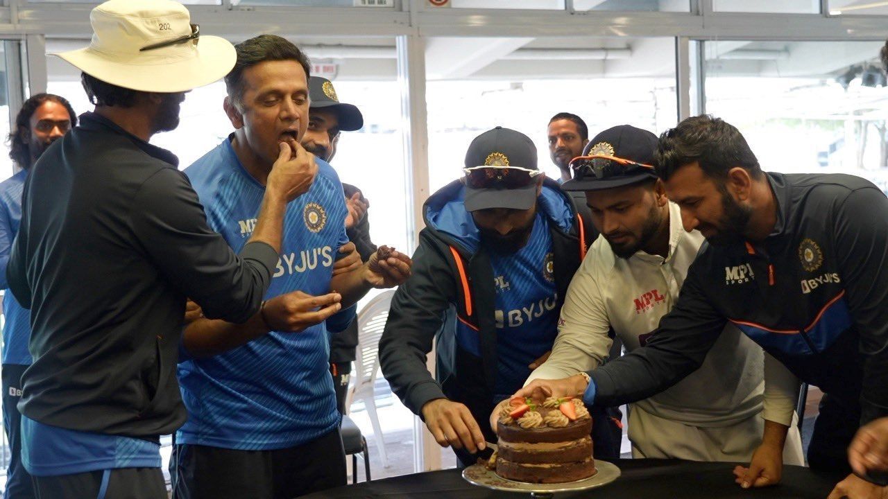 Batting coach Vikram Rathour (left) with the birthday boy.