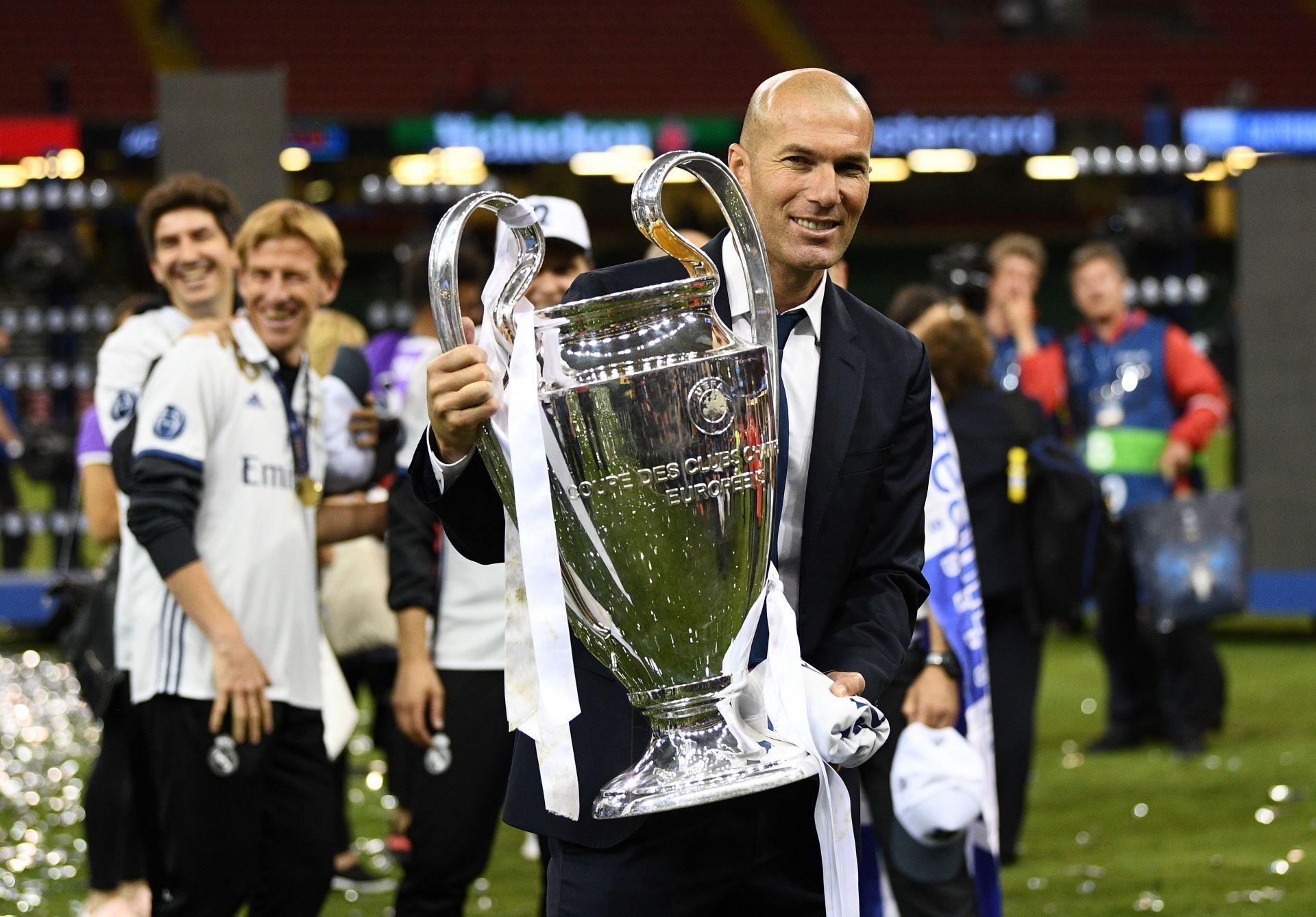 Zinedine Zidane poses with the Champions League trophy.