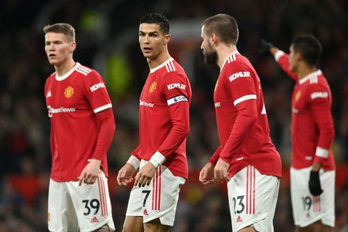 Scott McTominay, Cristiano Ronaldo and Luke Shaw of Manchester United