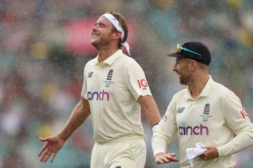 Stuart Broad enjoys drizzles as it interrupts the play.