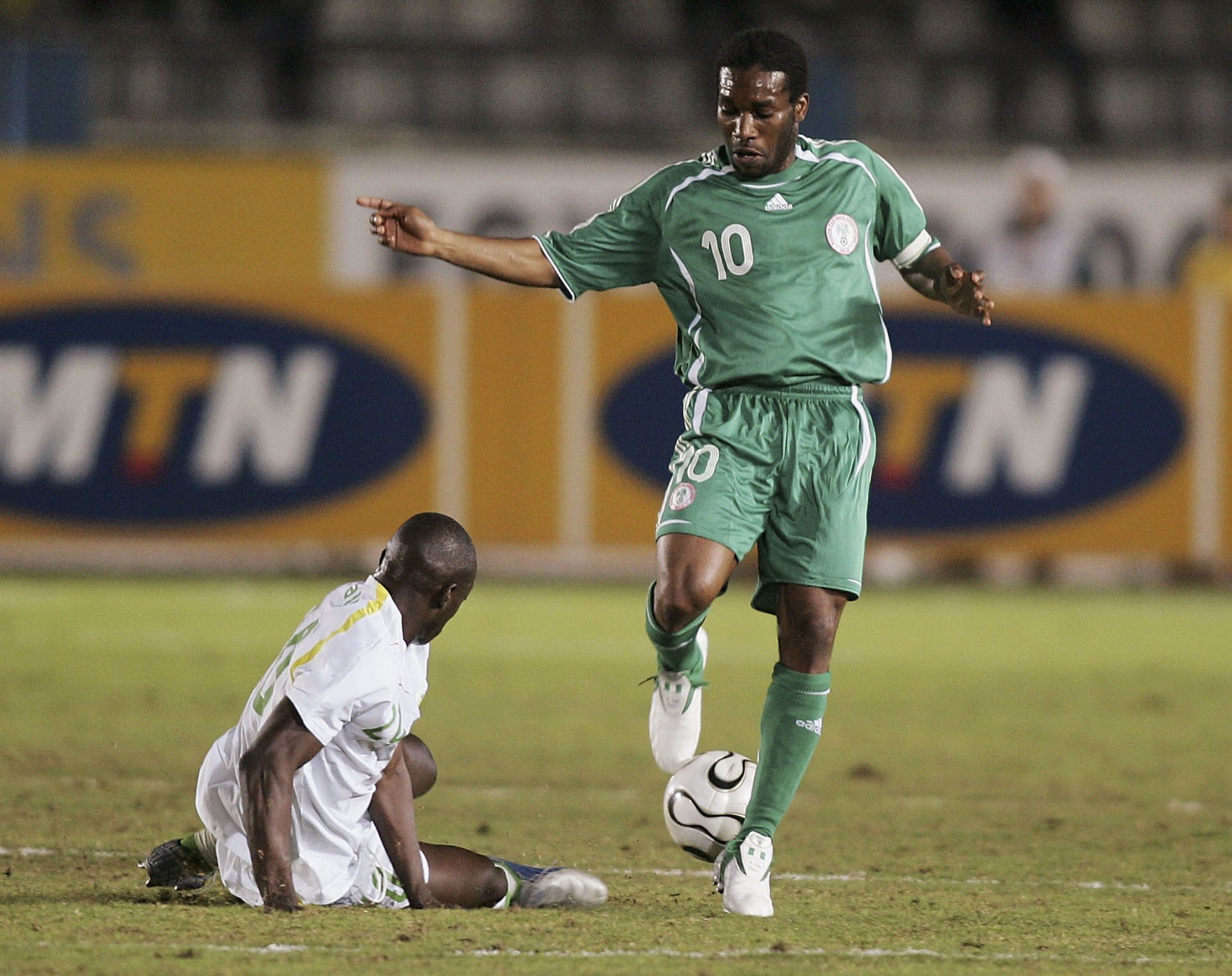 Okocha during a match against Senegal at the AFCON