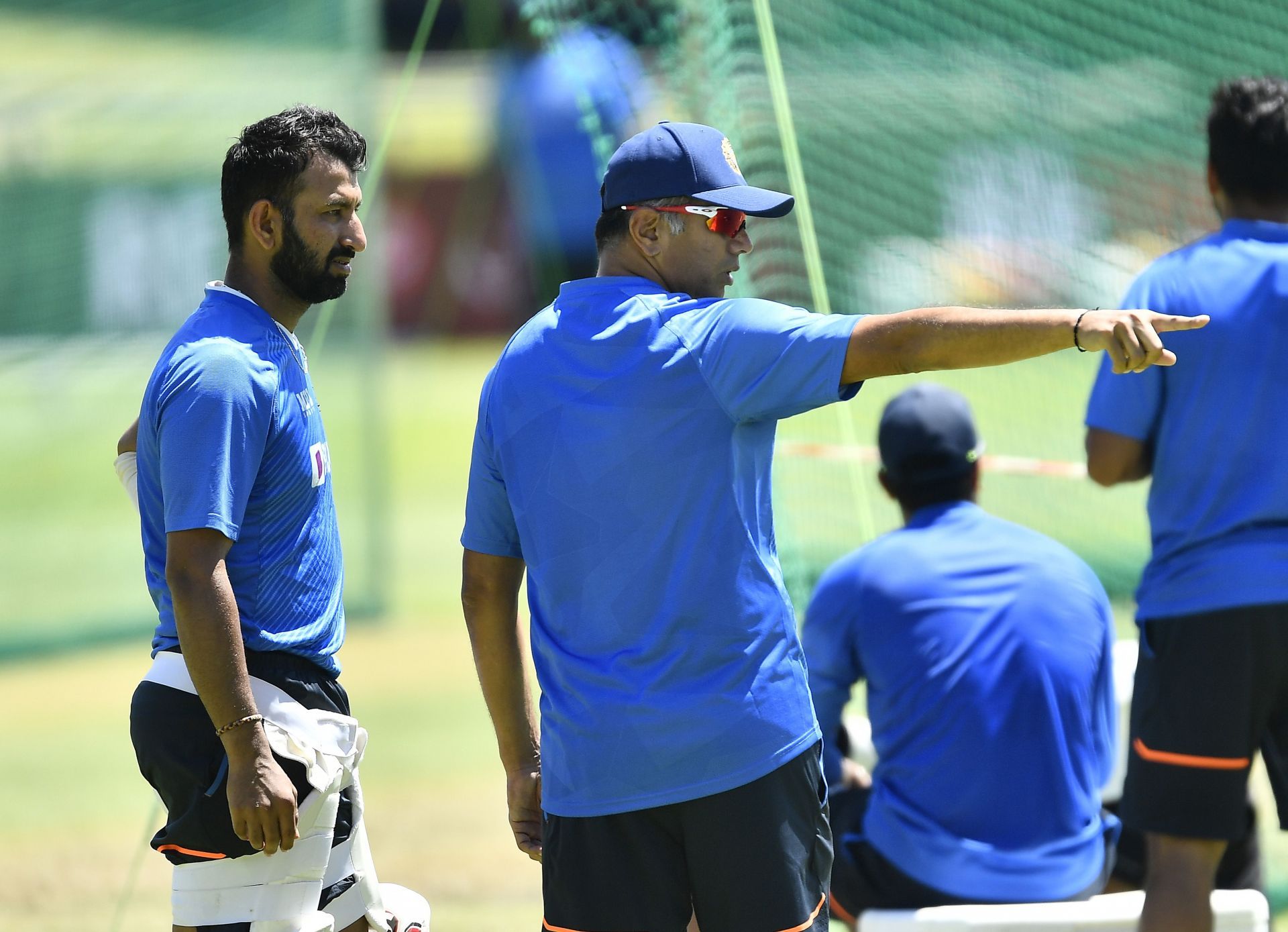 Rahul Dravid (R) and Cheteshwar Pujara (L) during a training session