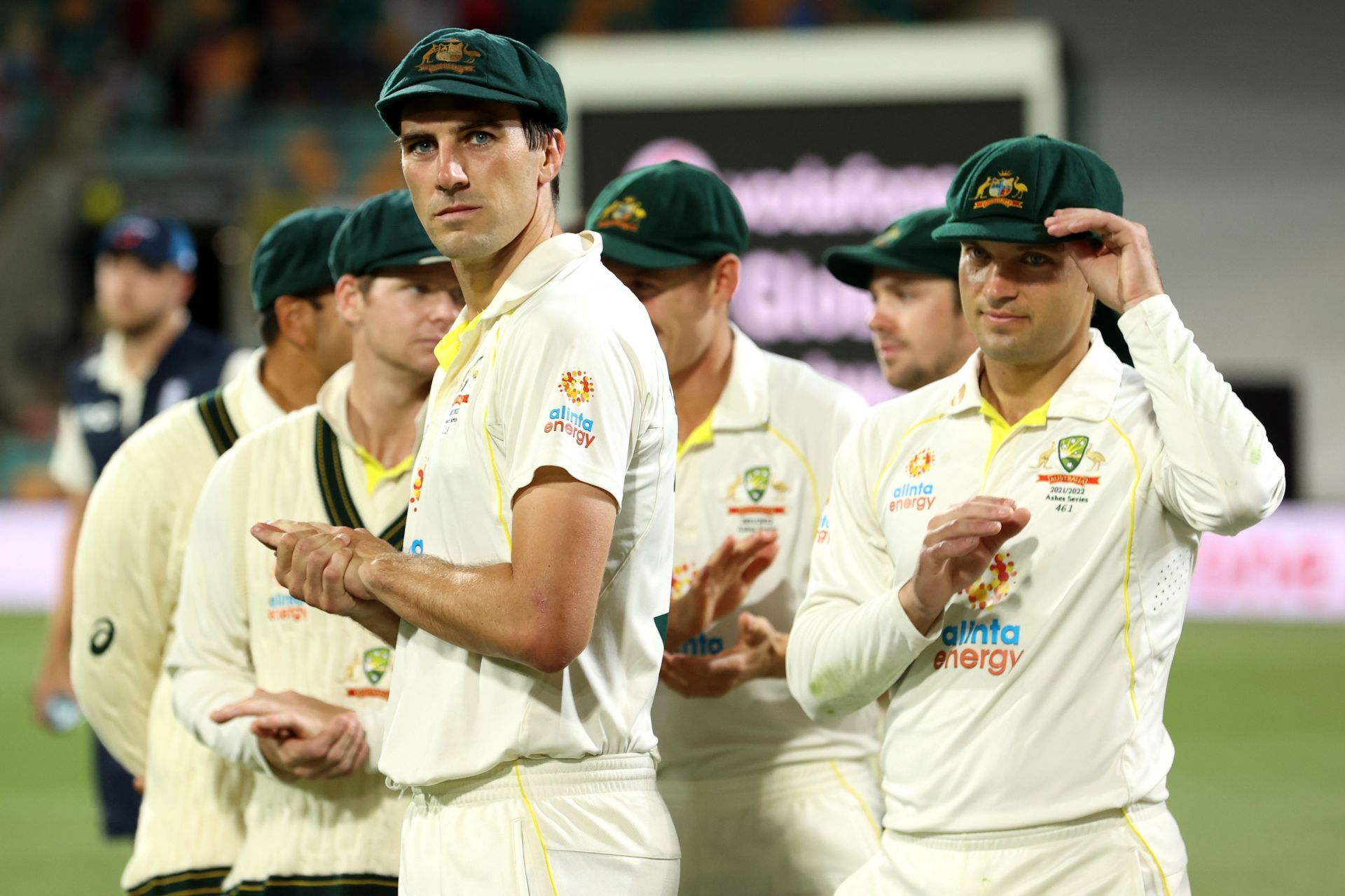 Pat Cummins looks on after winning the Ashes 