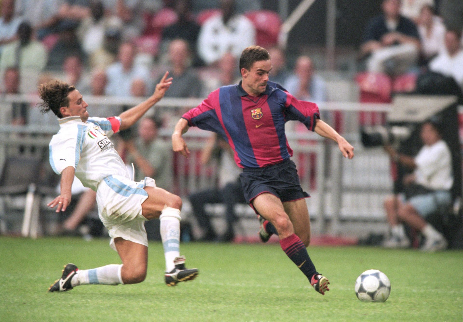 Marc Overmars (right) in a pre-season friendly vs Lazio