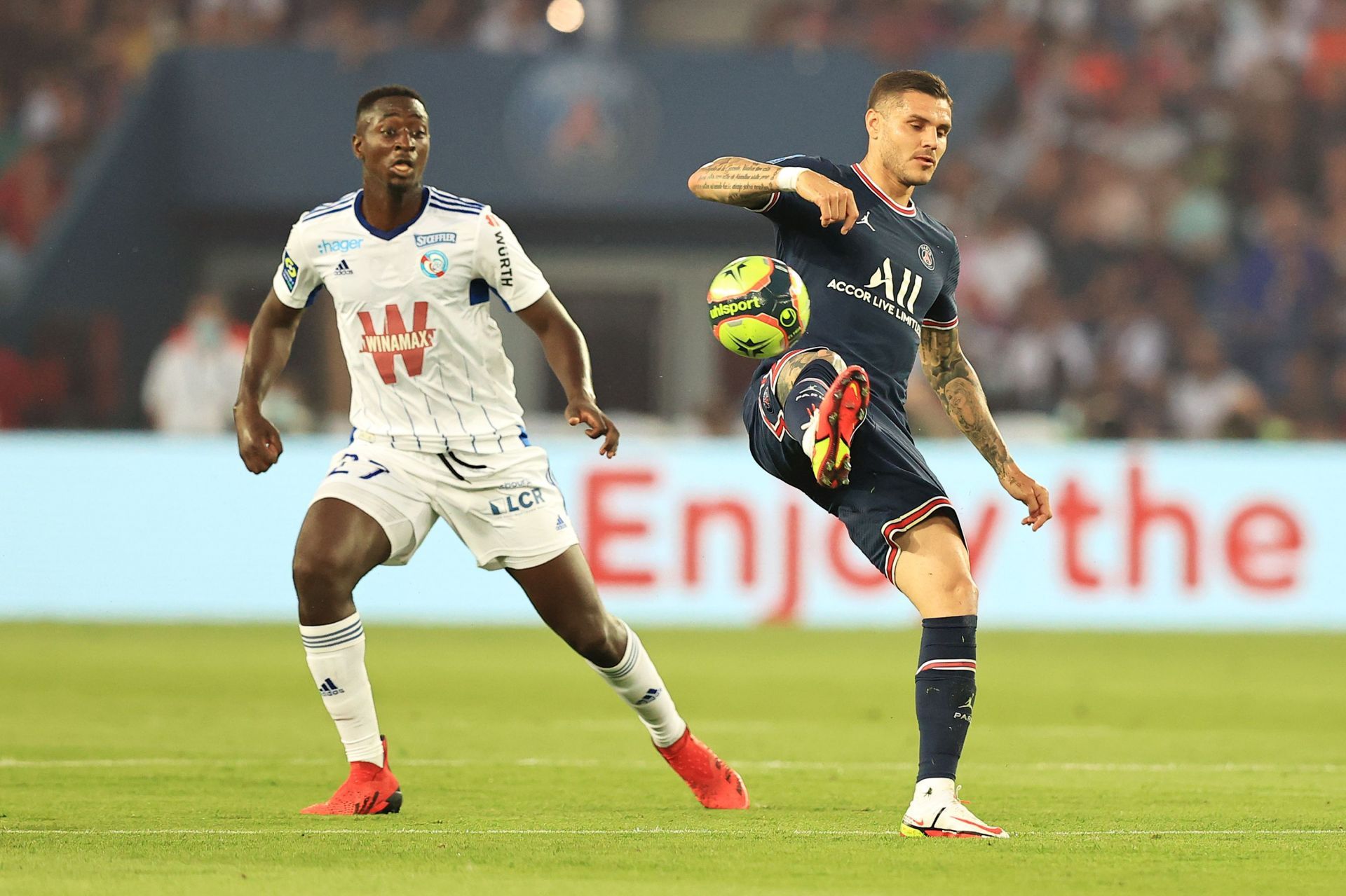 Ibrahima Sissoko(Right) for Strasbourg against Paris Saint-Germain in Ligue 1