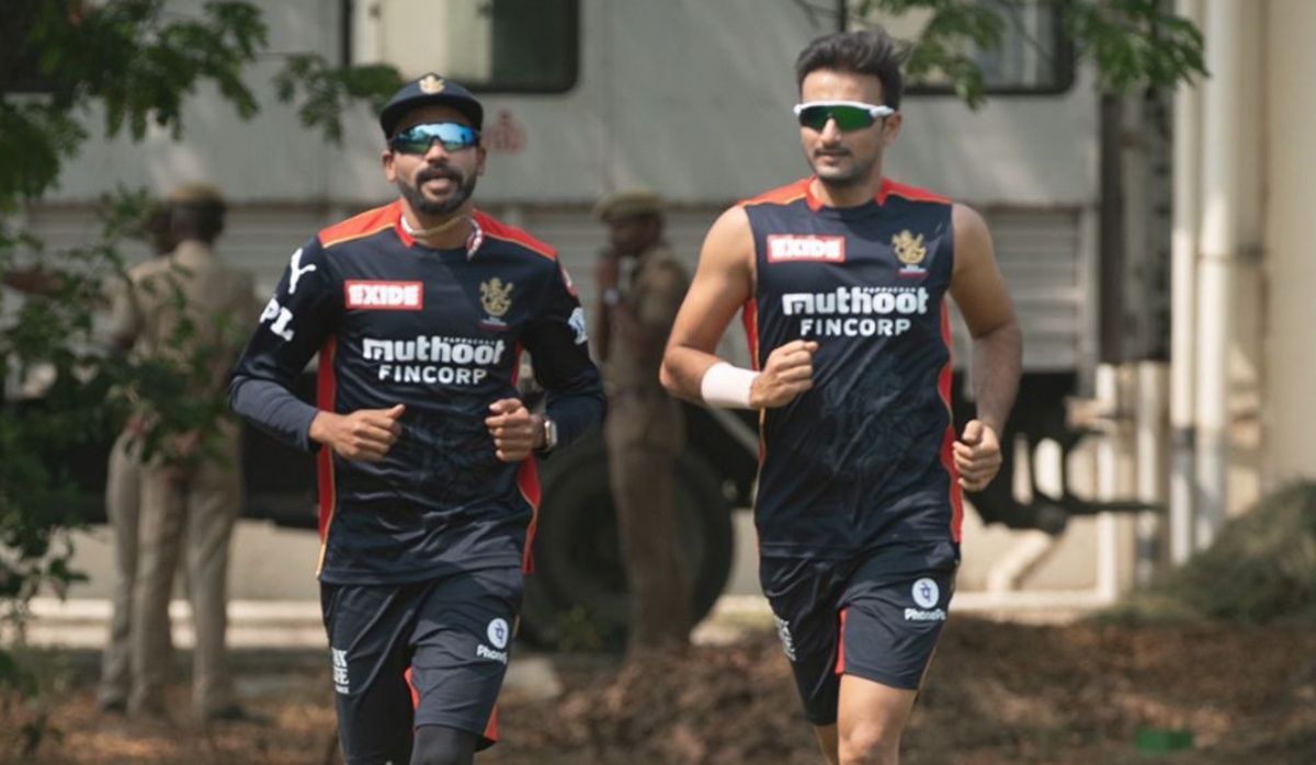 Mohammad Siraj (left) and Harshal Patel. Pic: @RCBTweets/ Twitter