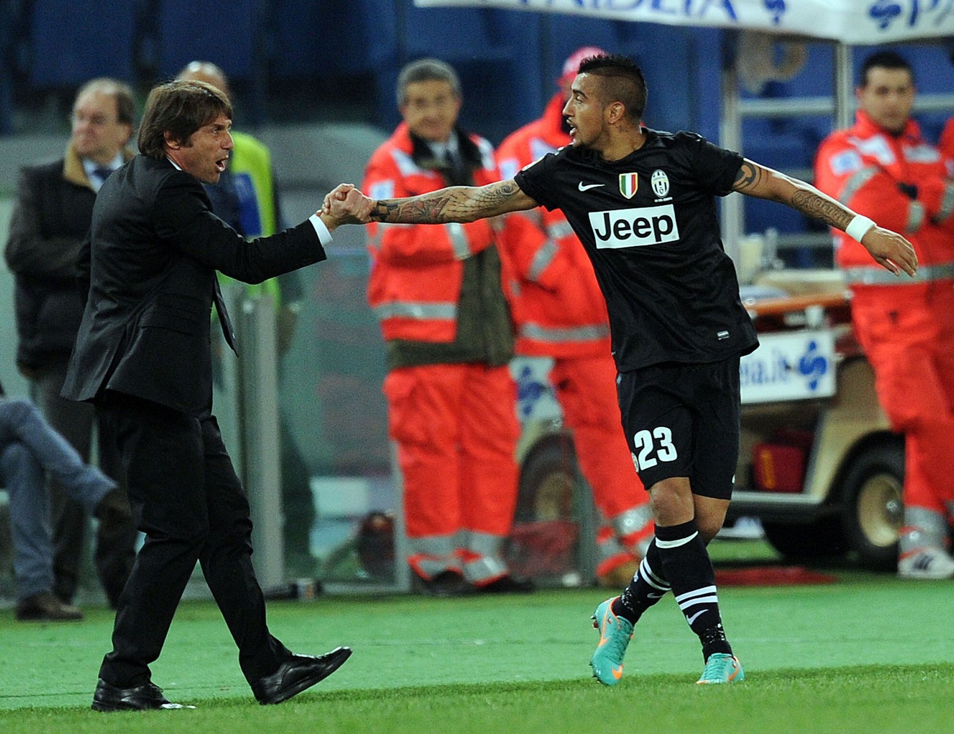 Arturo Vidal (right) had success under Conte (left).