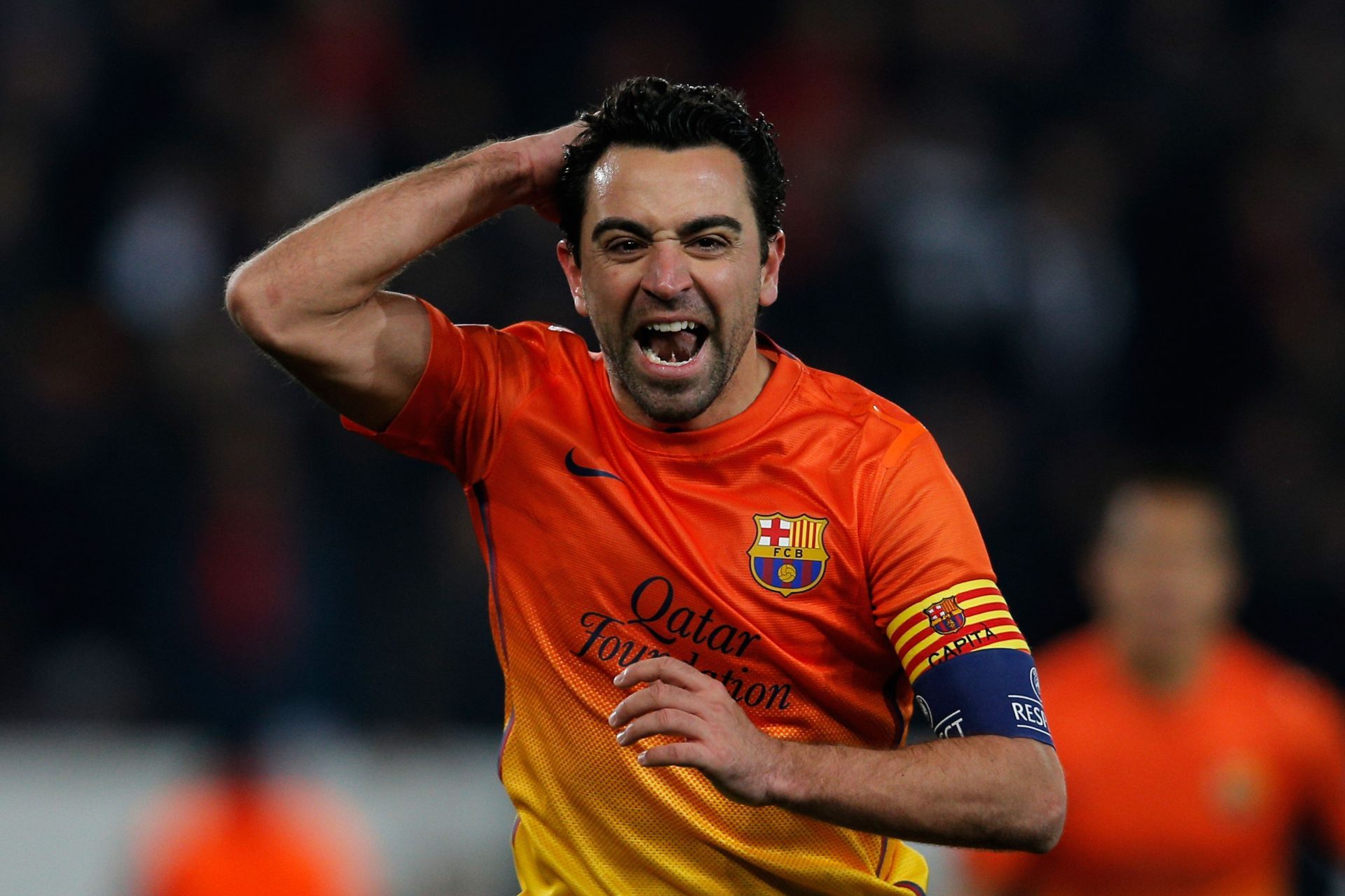 Paris St Germain v Barcelona - Xavi in action