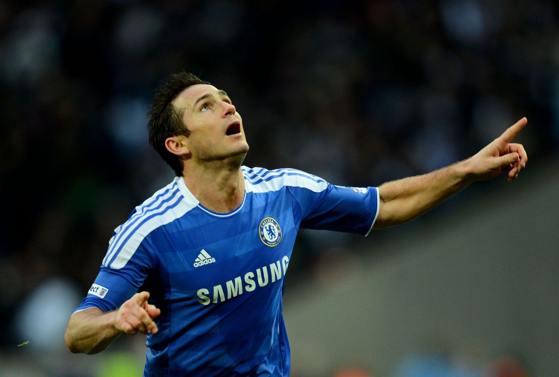 Frank Lampard celebrates a goal for Chelsea.
