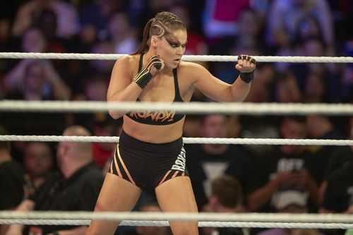 Ronda Rousey will face Charlotte Flair at WrestleMania!