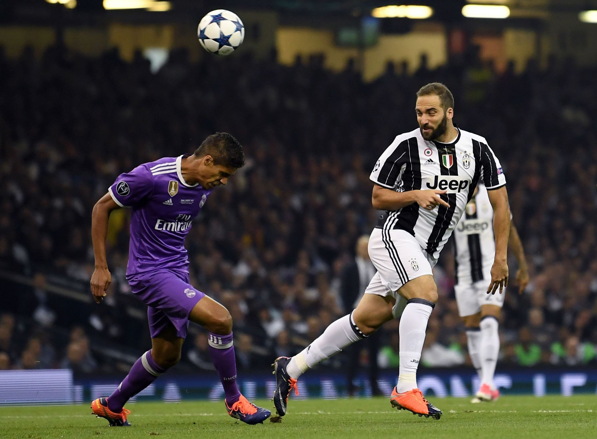 Gonzalo Higuain (right) in action against Real Madrid&#039;s Raphael Varane in the Champions League final.
