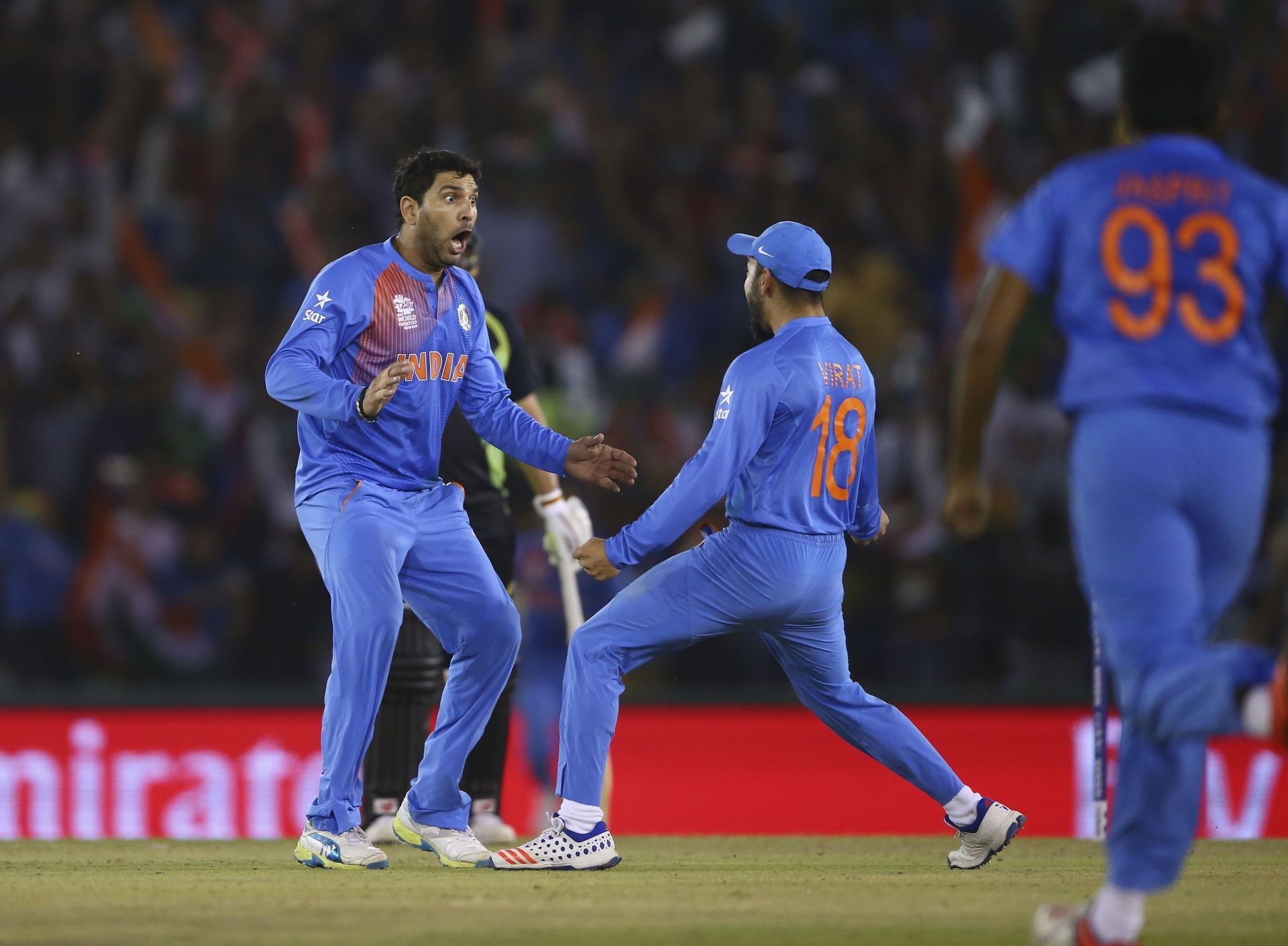 Yuvraj Singh (left) celebrates a wicket with Virat Kohli. Pic: Getty Images
