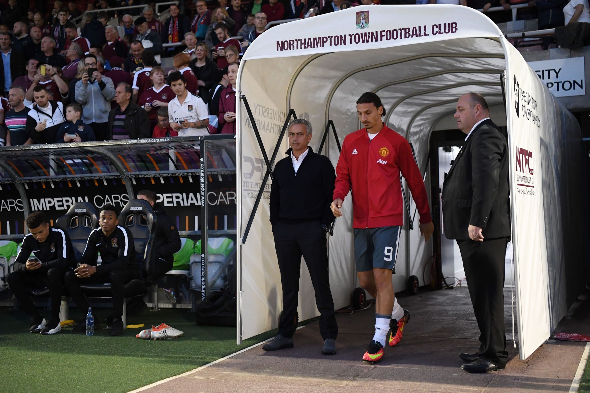 Zlatan Ibrahimovic (R) and Jose Mourinho (L) emerge from the tunnel.