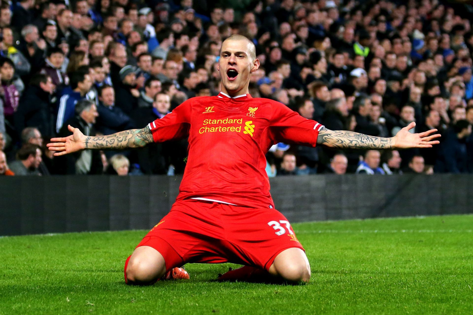 Skrtel celebrating against Chelsea