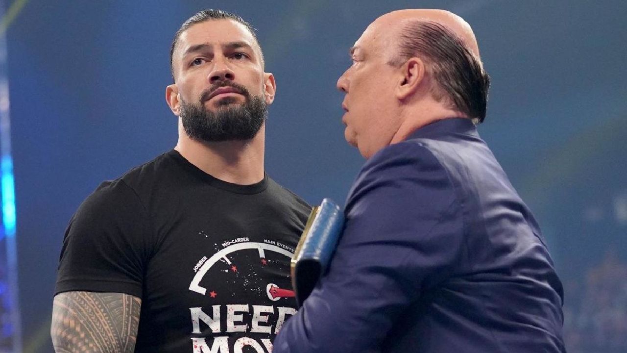 Reigns with his manager, Paul Heyman
