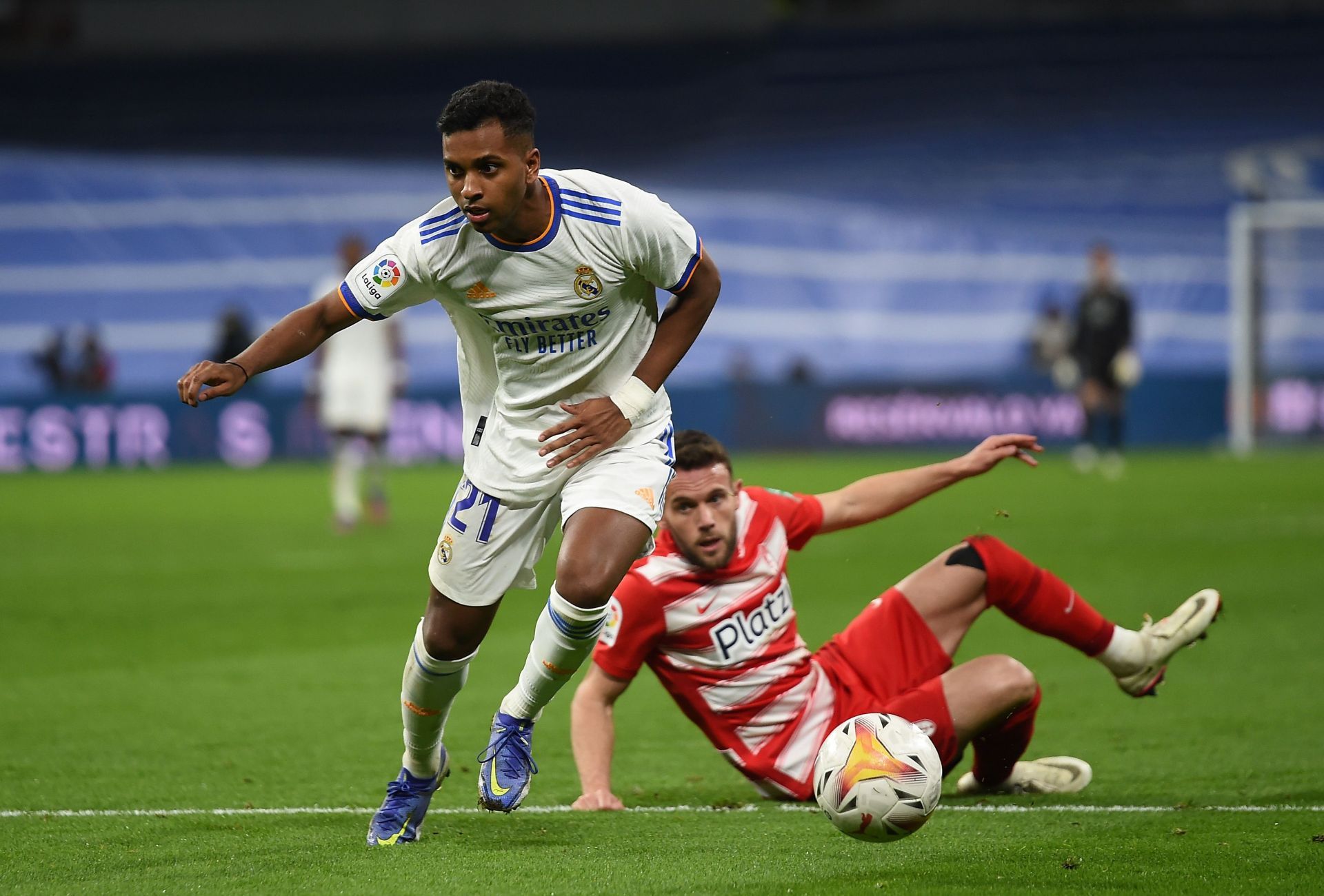 Rodrygo dribbles past Quini.