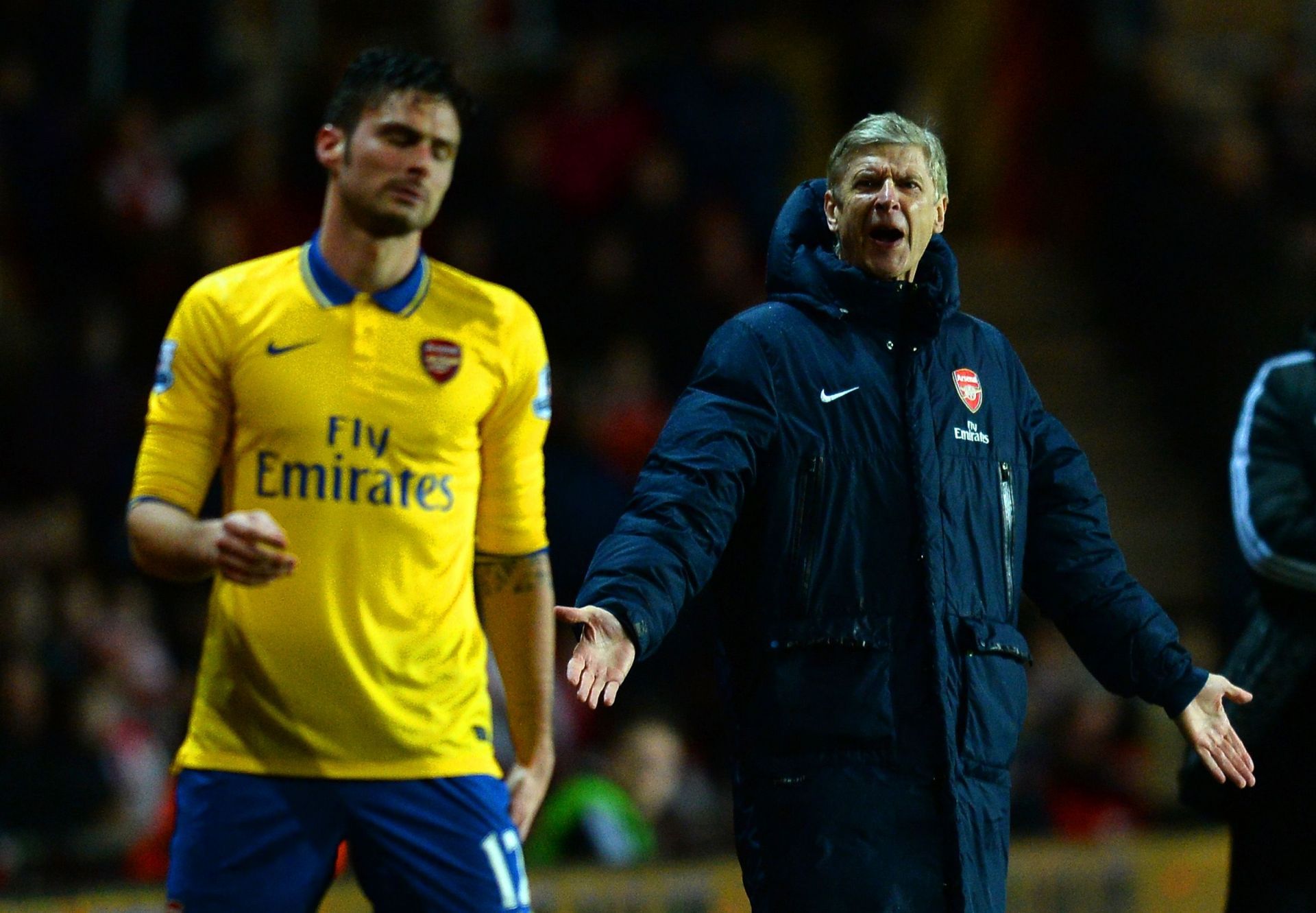 Olivier Giroud (left) scored over 100 goals under Wenger (right).