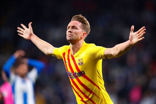 Luuk de Jong celebrates after scoring a goal.