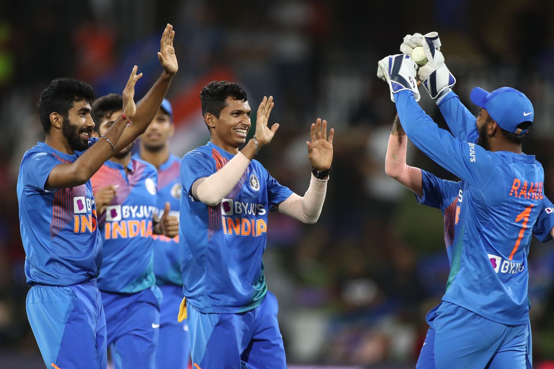 Navdeep Saini celebrates a wicket with teammates. Pic: Getty Images