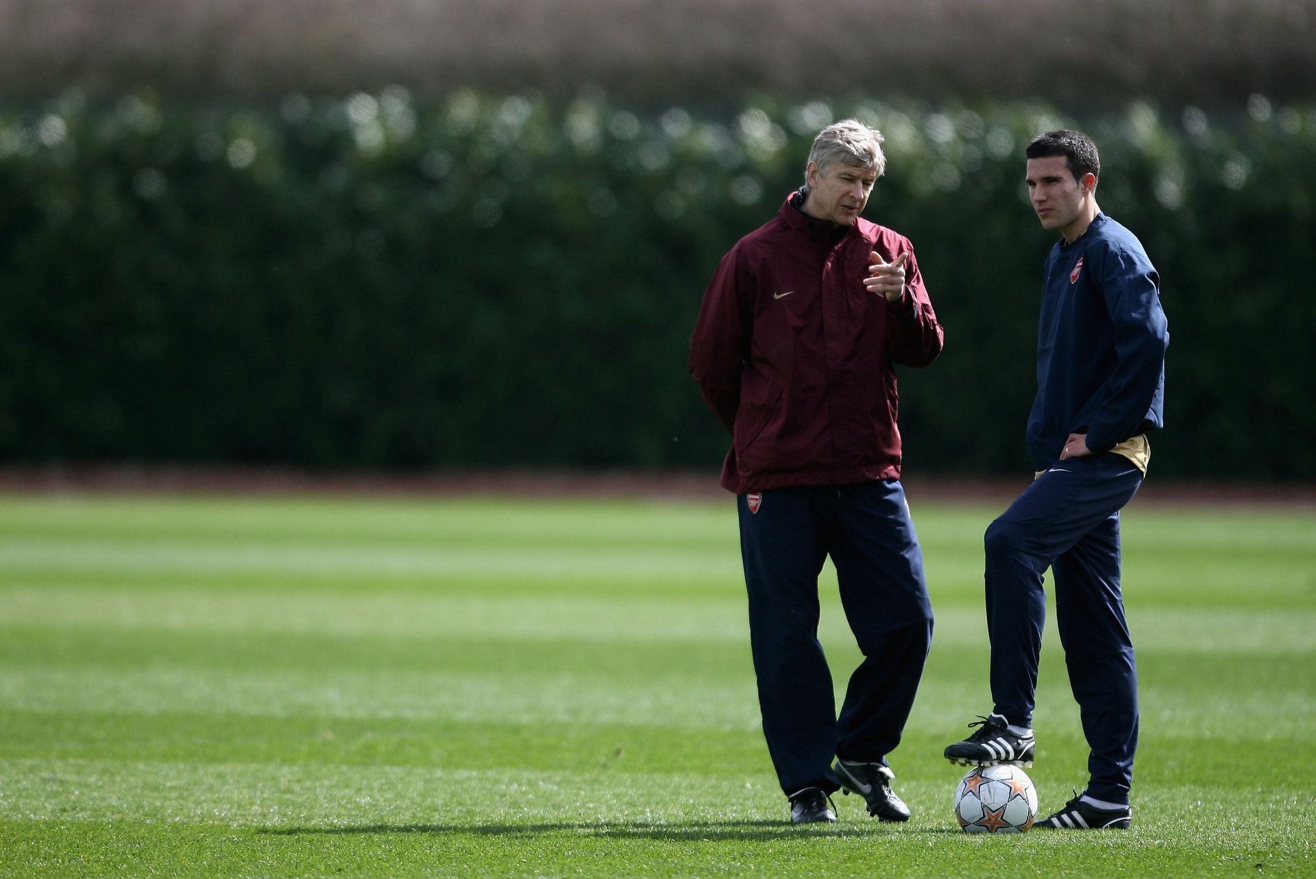 Robin van Persie (right) scored a lot of goals under Wenger (left).