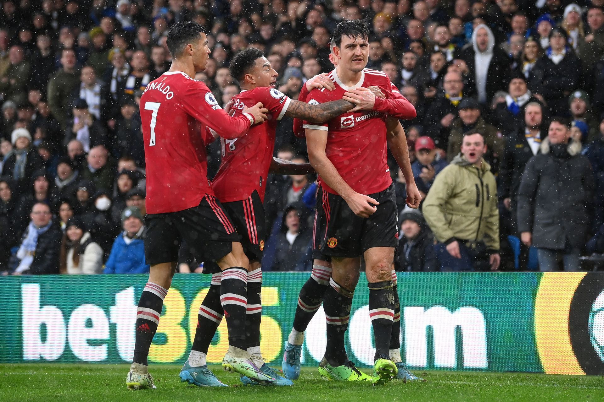 Harry Maguire (right) has had a torrid time at United.