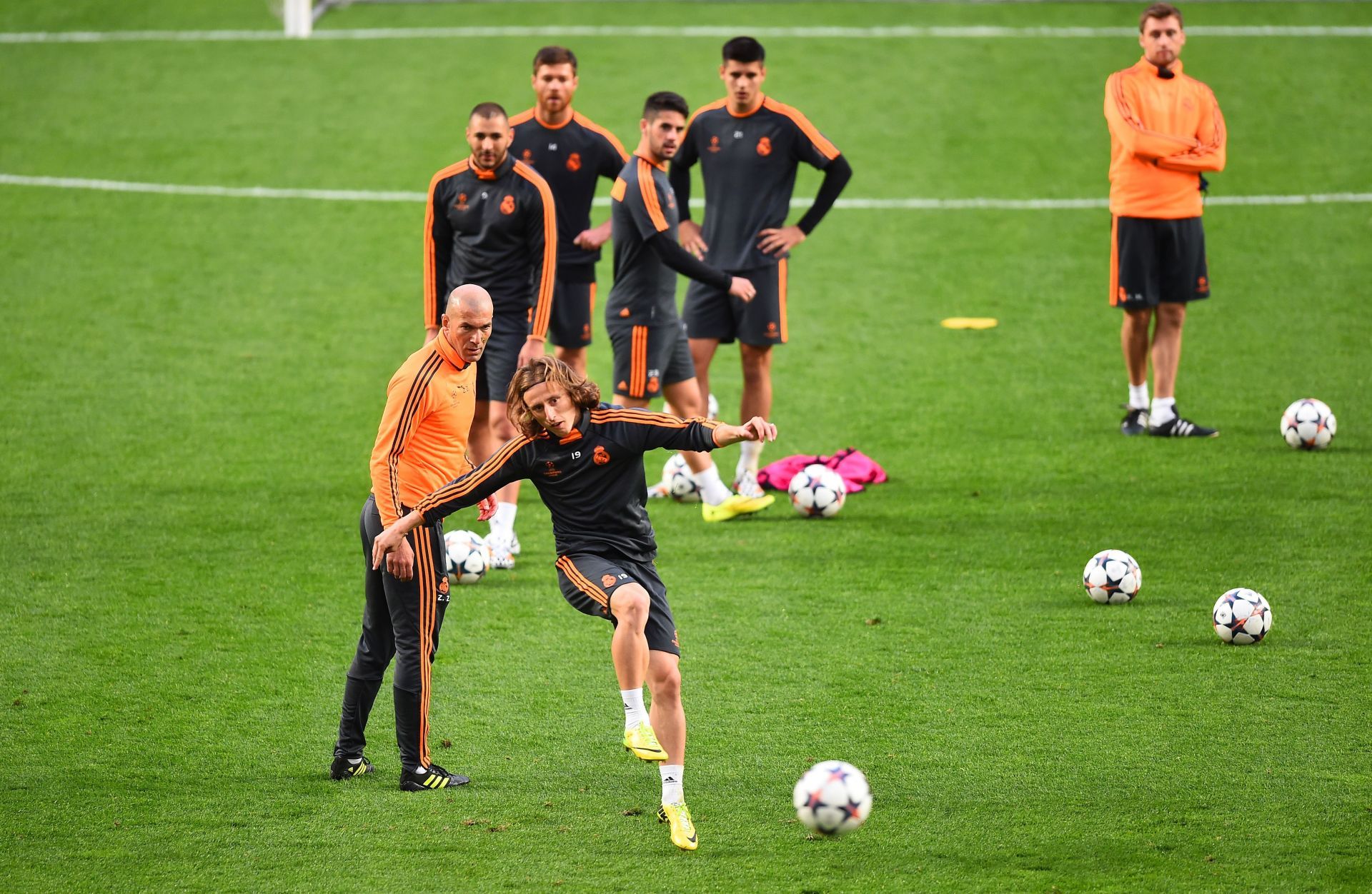 Luka Modric in training under the Frenchman&#039;s watchful eye.