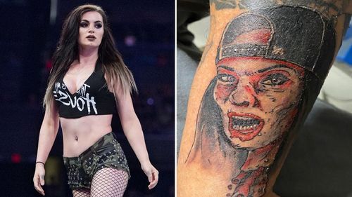 The former Women's Champion seemed surprised after seeing a fan's tattoo