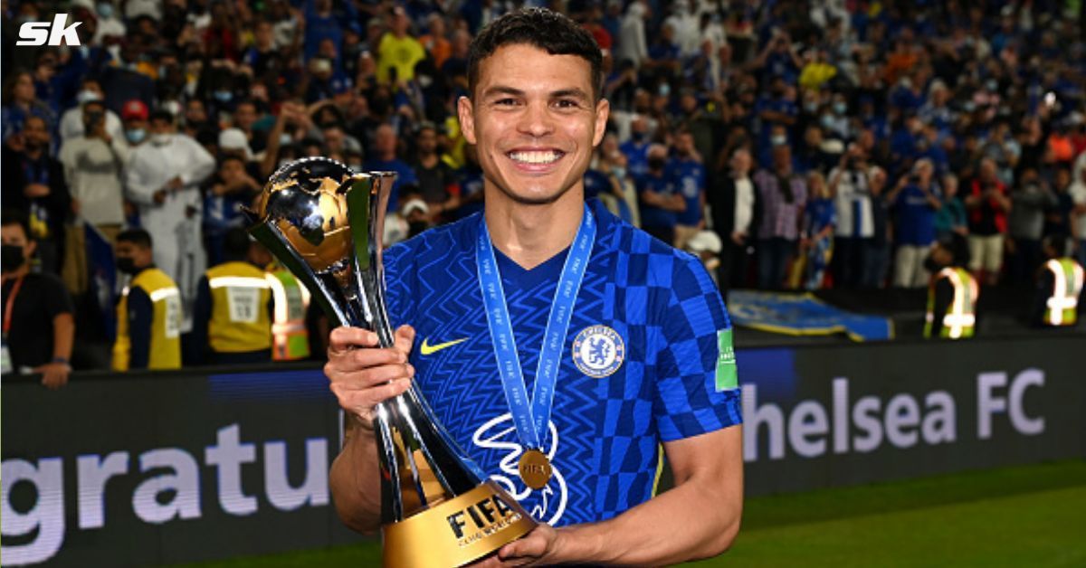 Thiago Silva holding the FIFA Club World Cup trophy