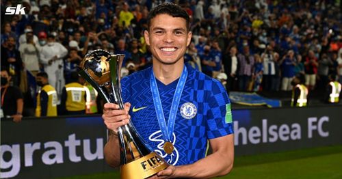 Thiago Silva holding the FIFA Club World Cup trophy