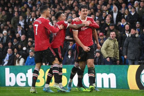 Manchester United players celebrate Harry Maguire's goal against Leeds on the weekend.