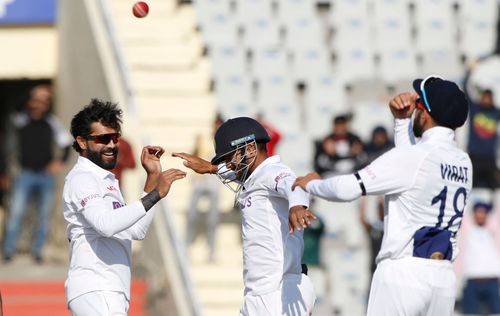 Ravindra Jadeja celebrates the wicket of Dimuth Karunaratne.