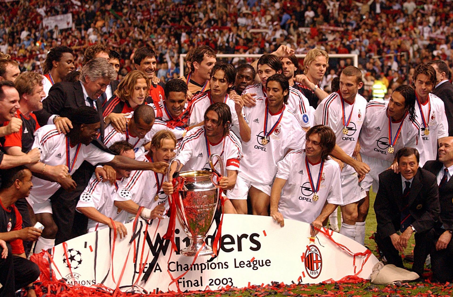 Paolo Maldini leading the celebrations.