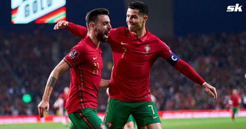 Cristiano Ronaldo and Bruno Fernandes celebrate Portugal's first goal against North Macedonia