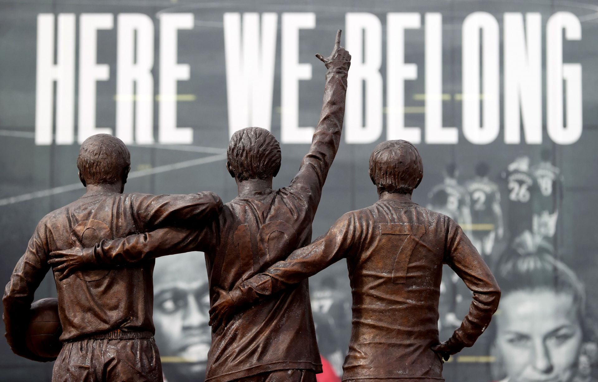 The Holy Trinity stands tall in front of the Old Trafford