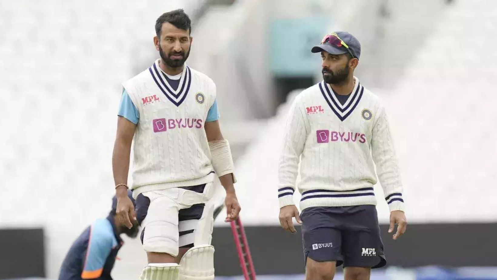 Cheteshwar Pujara (L) and Ajinkya Rahane.