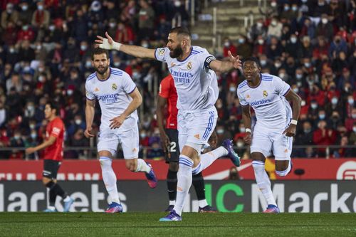 Karim Benzema celebrates after scoring a goal.