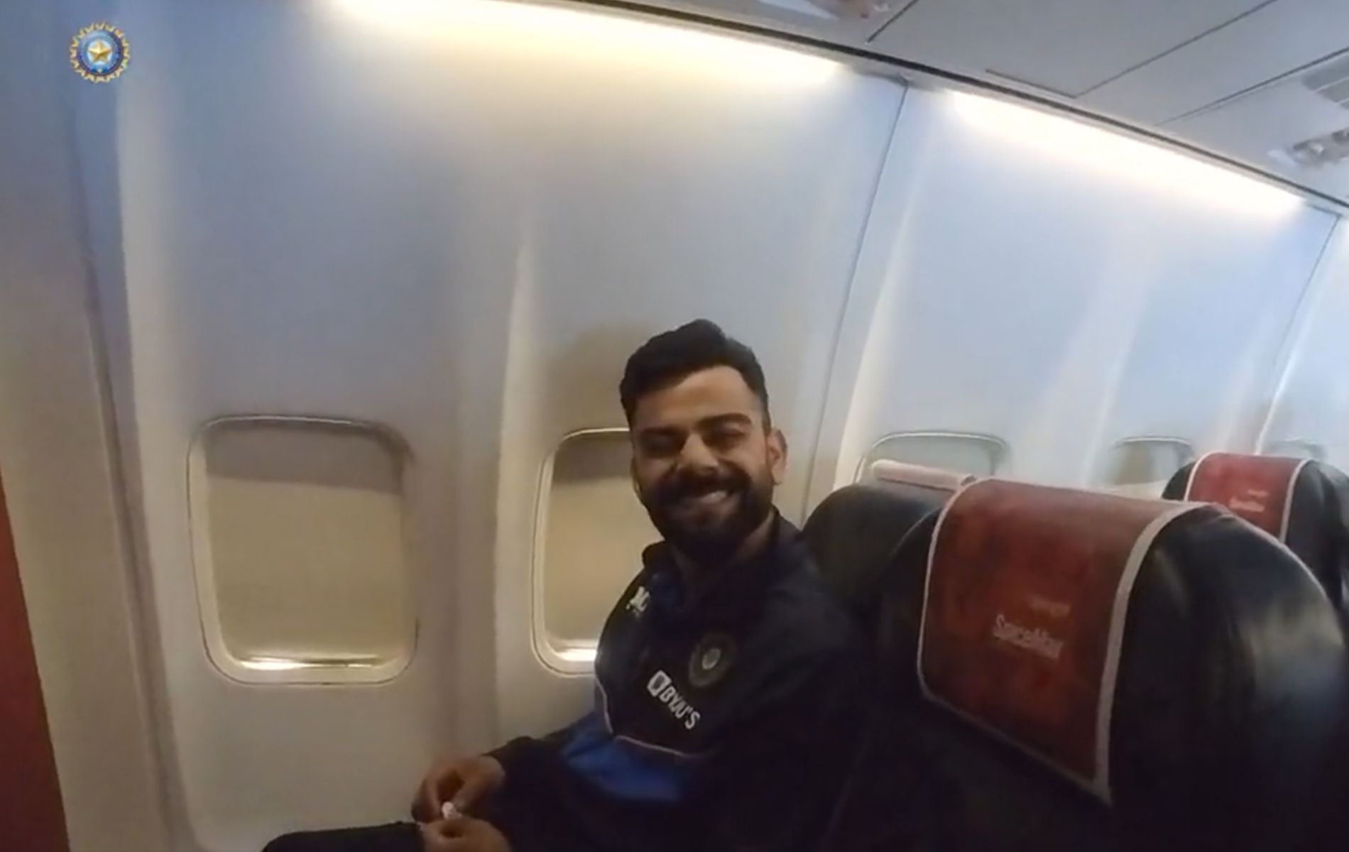 Virat Kohli was all smiles on the flight from Mohali to Bengaluru.