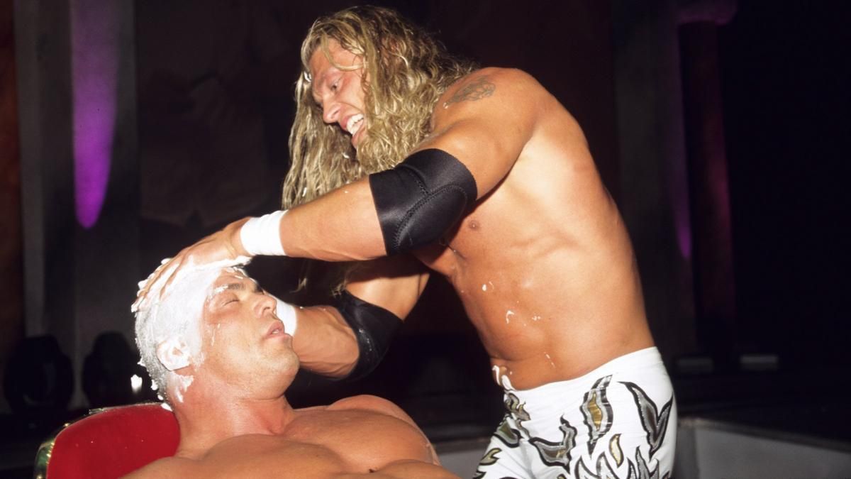 Edge was only too happy to cut Angle's hair