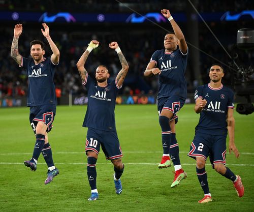 PSG celebrate in front of their fans after a win.