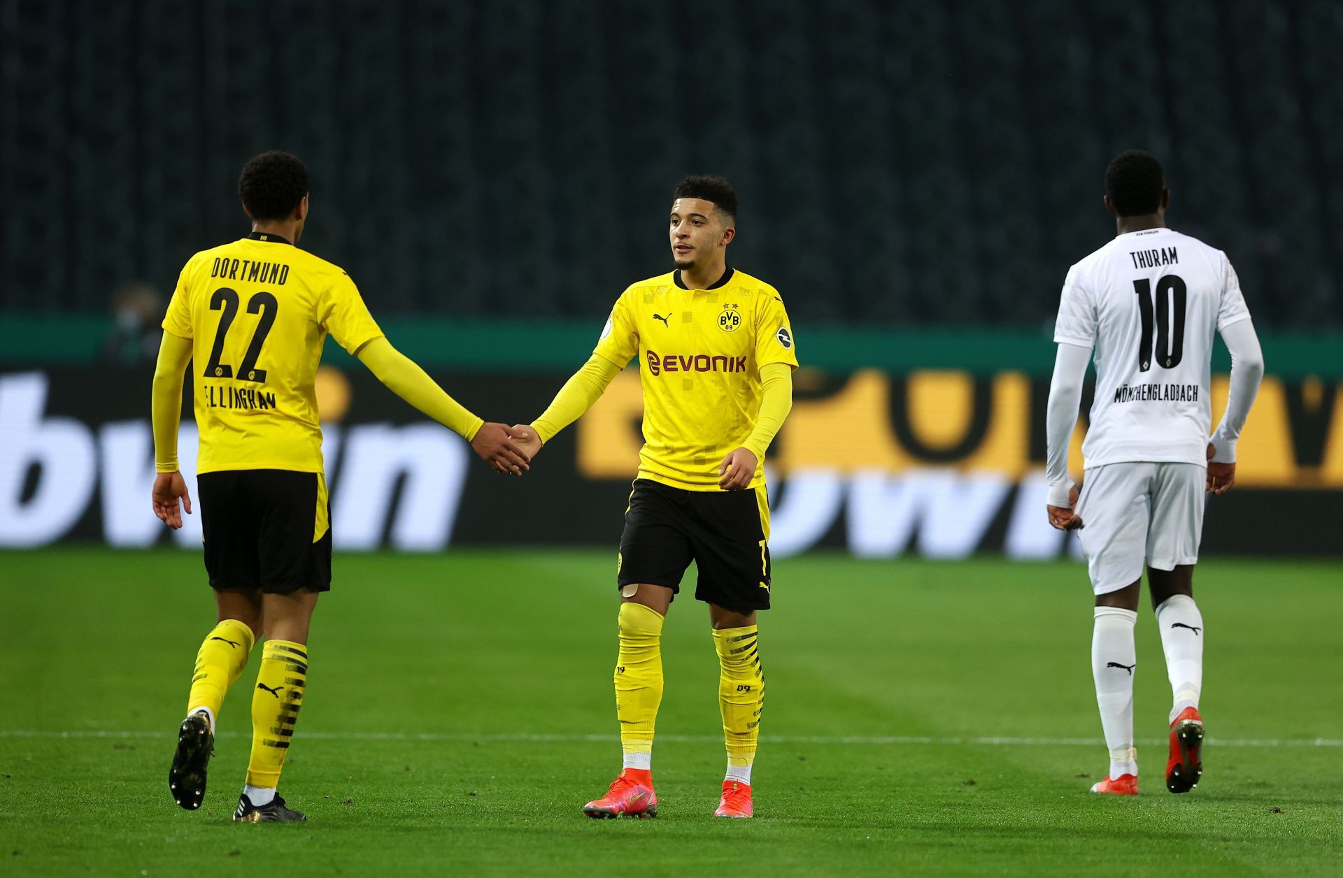 Jude Bellingham could join Jadon Sancho (centre) in the Premier League next season.