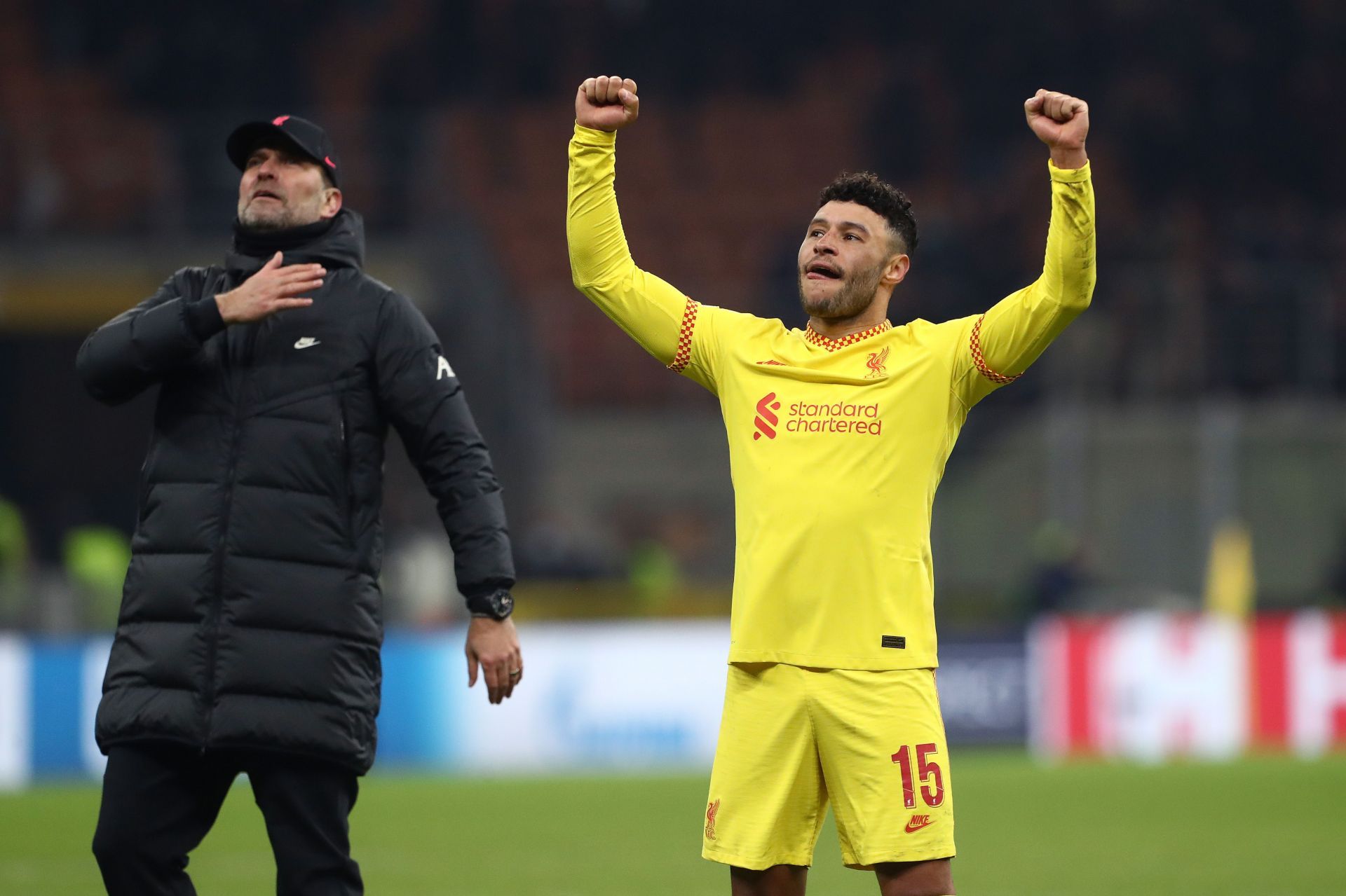 Jurgen Klopp and Alex Oxlade-Chamberlain celebrate a win