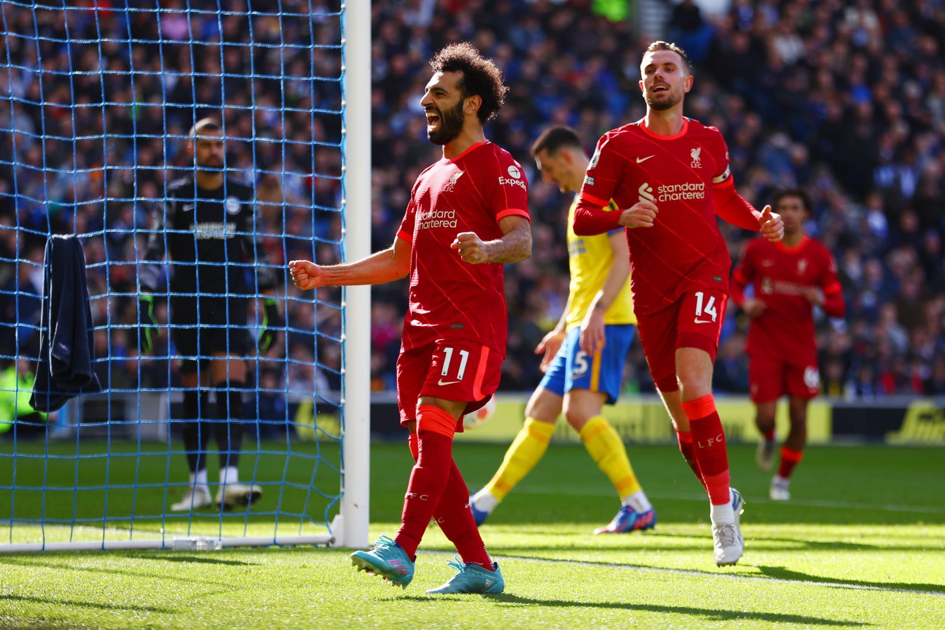 Mohamed Salah celebrates after scoring a goal