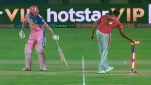 Ravichandran Ashwin runs out Jos Buttler at the non-striker's end after the latter had backed up too much